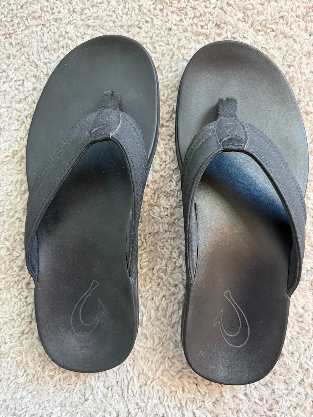 OluKai Black Flip Flop Sandals with Subtle Logo